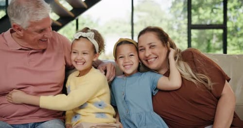 Grandparents, children and happy in lounge, laugh and excited for family picture on couch