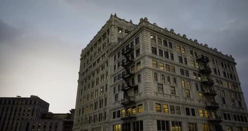 Historic Building Illuminates the Twilight Sky and Surrounding Area