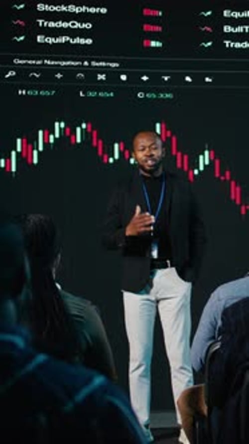 Vertical Video African American Stockbroker Explains Trading Performance and Profit Trends