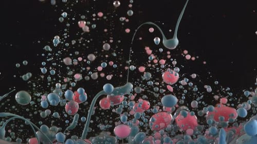 Colorful spheres and liquid suspended in dark space