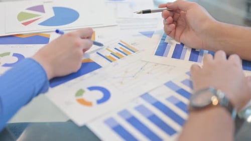 Close up of Creative People Working on Documents