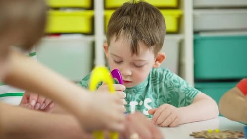Kids Learning Fine Motor Skills with Toys