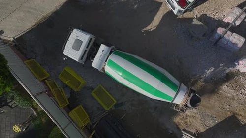 Aerial Video Concrete Pouring and Metal Work in Progress on a MultiStory Building Captured From the