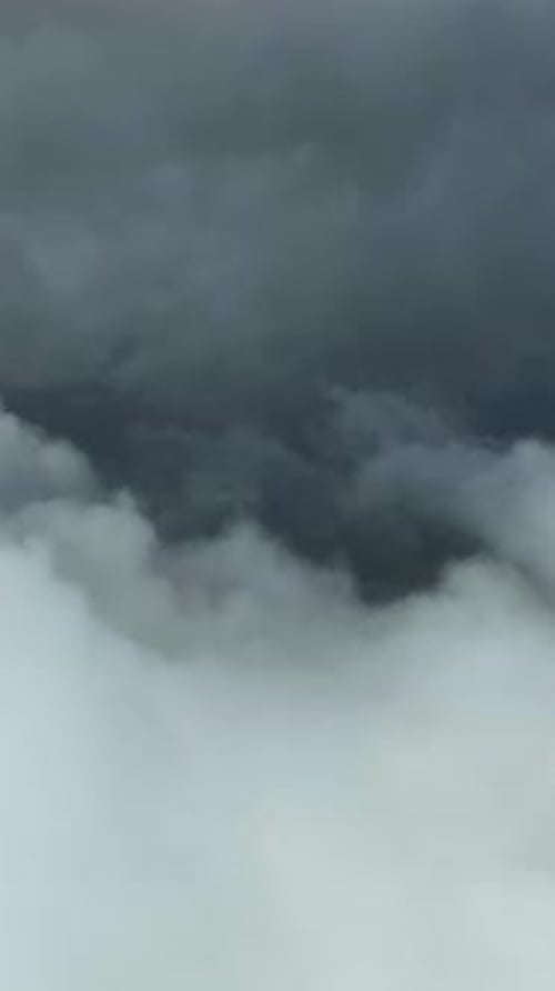 Vertical Video Cloudy Landscape in the Mountains Aerial View