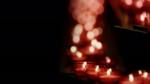Red Wish And Pray Candles In A Catholic Church 24