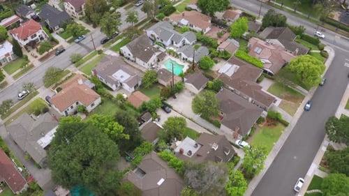 Aerial Drone footage of Neighborhood in Suburbia Pasadena, California USA Residential of Houses Road