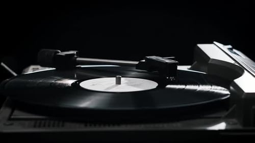 Vinyl Record Spinning on Vintage Turntable