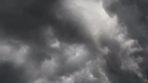 view of the Power of Thunderstorms in the Dark Clouds 4k.