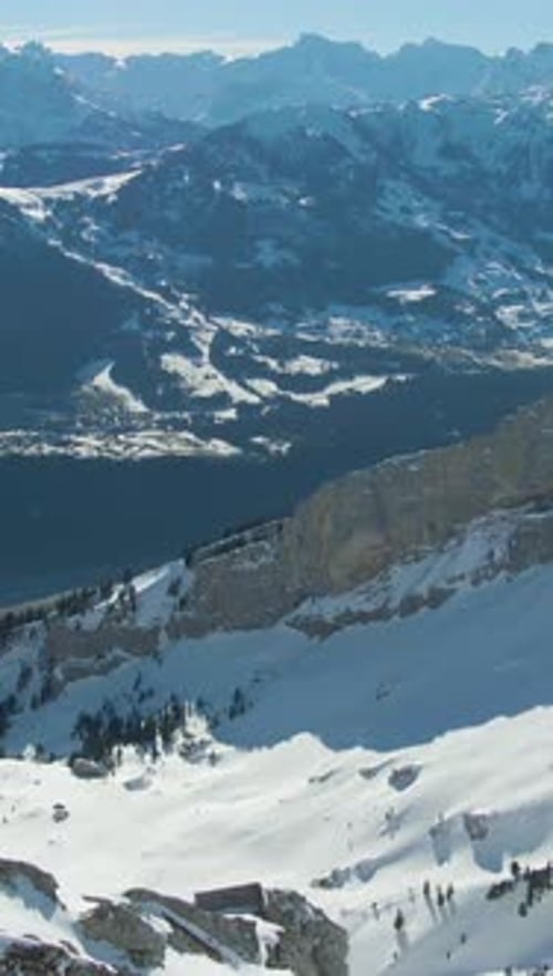 Ridge and Mountain Range on Background Swiss Alps Switzerland Aerial View Vertical Video