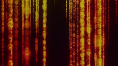 Glamour Collection: Strings of orange reddish bokeh passing across a black background