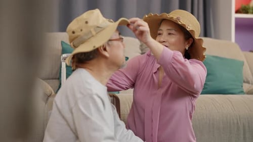 Loving Senior Couple Preparing for Vacation