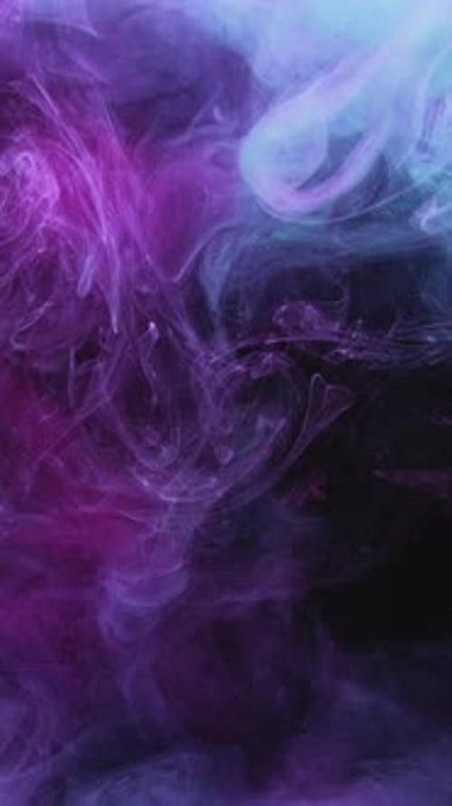 Swirling Purple Pink and Turquoise Paint in Liquid