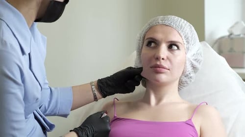 Woman Receives Cosmetic Injection at Medical Clinic