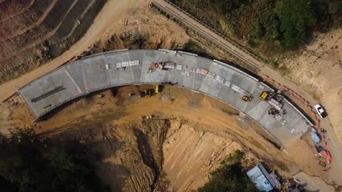 Aerial view of development of new road construction or overpass under construction.
