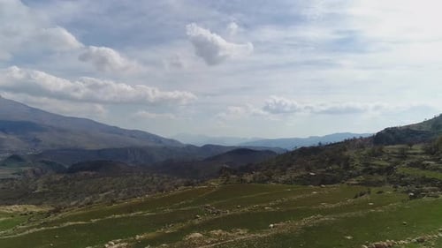 Stunning Aerial View of a Valley in the Mountains in Spring