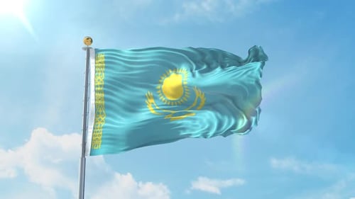 Kazakhstan National Flag Waving in the Wind against a Blue Sky