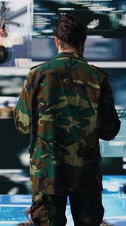 Bearded Man Using Tablet in Futuristic Control Room