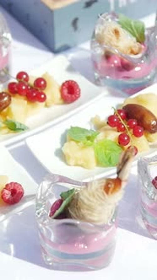 Colorful Dessert Presentation Showcases Fresh Fruits and Delicate Garnishes for a Stunning Culinary