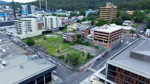 Drone aerial pan main street CBD Gosford city abandon derelict urban building land site vacant block