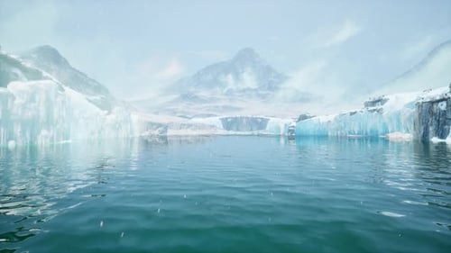 Vast Ocean View With Distant Snow Covered Mountain Range Rising