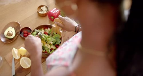 Preparing Fresh Salad with Colorful Vegetables at Home