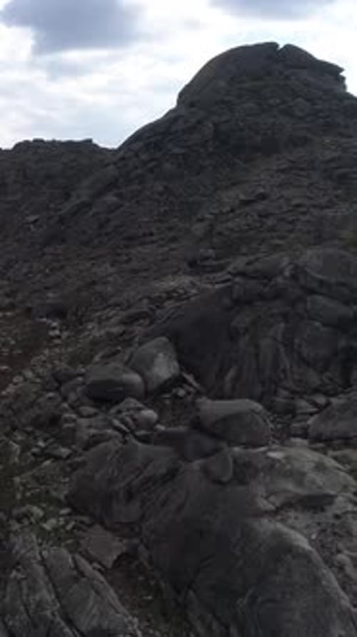 Vertical Video of High Mountains Rocks Formation Aerial View