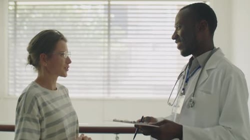 Doctor Discussing Health with Female Patient