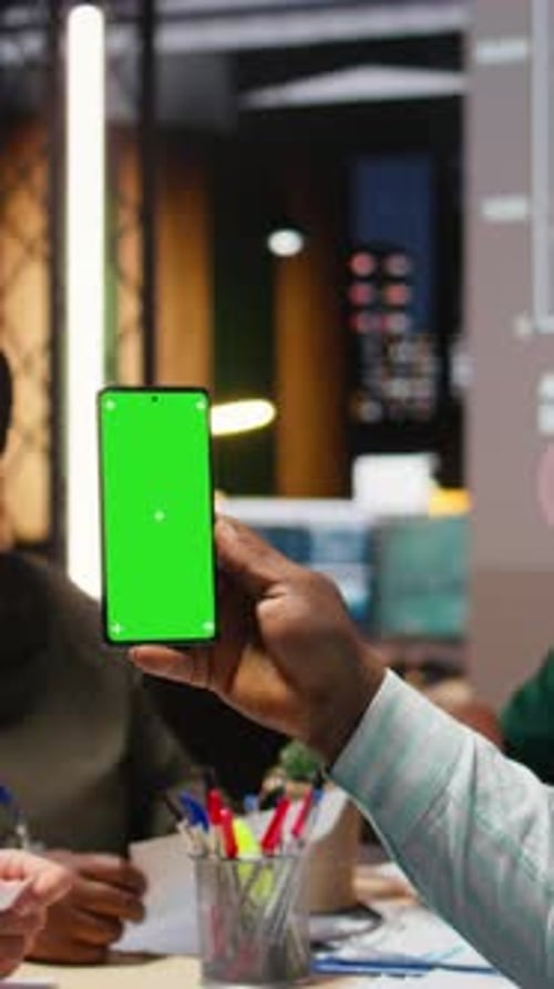 Vertical Video Diverse Company Workers Hold Phone with Isolated Chroma Key