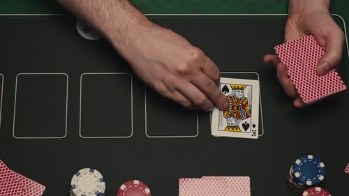 Game of Poker in Casino Taking Place with Poker Chips and Cards on a Green Table Gambling Place