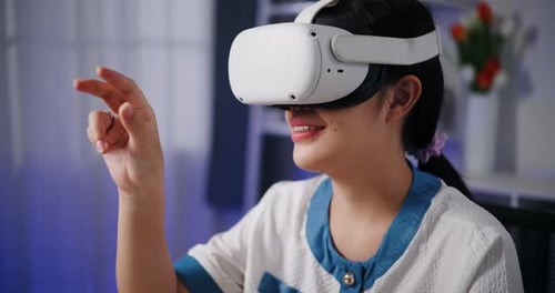 Woman Using Virtual Reality Headset at Home