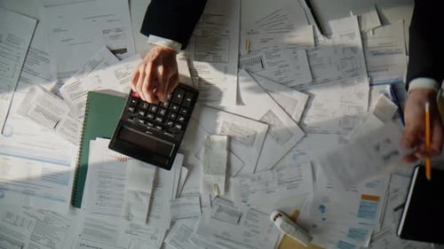 Accountant Calculating Corporate Budget Planning Money Profit at Table Top View