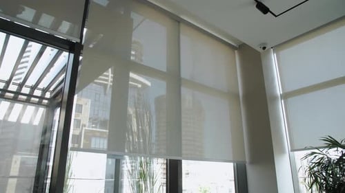 Blinds on the Window That Open Create a Pattern of Light and Shadow Adding a Calm Atmosphere to the