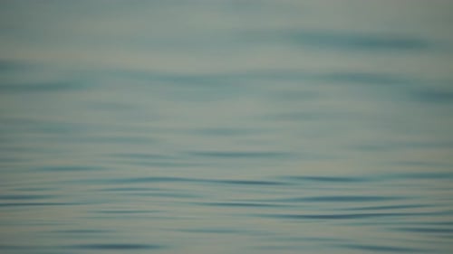 Sea Water Surface Camera Flies Over the Calm Azure Sea Nobody Holiday Recreation Concept Abstract