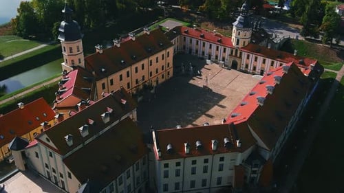 Aerial view on residential castle near Minsk. Fly over Nesvizh Palace in the morning. Cinematic dron