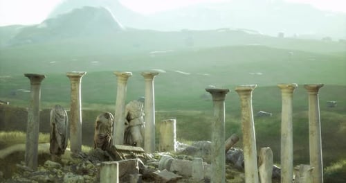 Ancient Ruins with Columns and Statues in a Misty Landscape at Dawn