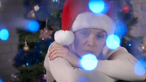 Sad Relaxing Woman at Christmas Indoor
