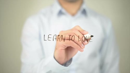 Learn to Love, Man Writing on Transparent Screen