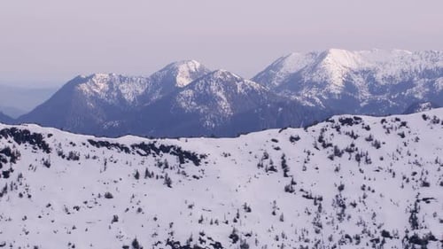British Columbia, Canada Circa-2018. Aerial View of Snow Covered Mountain Range