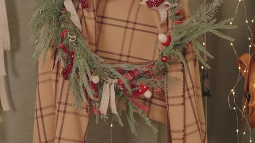 Festive Christmas Wreath with Plaid Ribbon and Garland