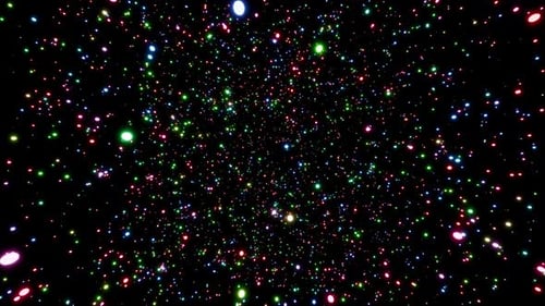 Parallax effect of glowing colored particles rotating seamlessly against a black background