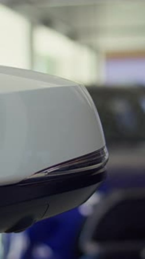 Vertical Video Showcased Car Close Up Shot of Rear View Mirror