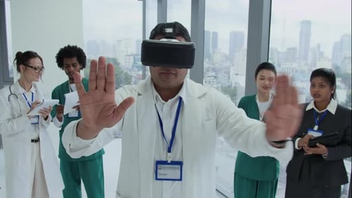 Doctor Uses VR Headset with Medical Team