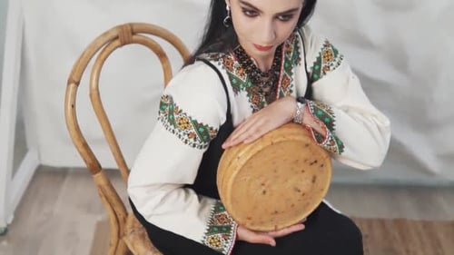 Stylish Woman with Cheese Posing Indoors