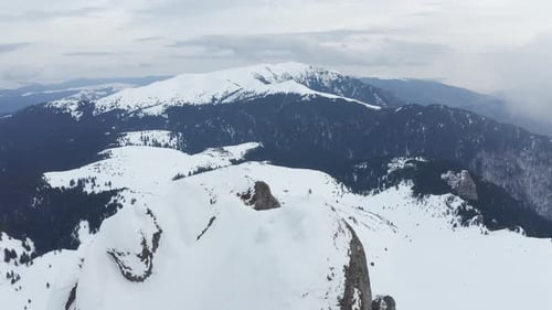 Snowy Mountain Range Aerial Landscape in Winter