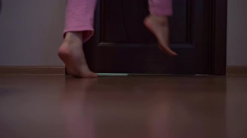 Woman goes in room on tiptoe late at night scared to make noise