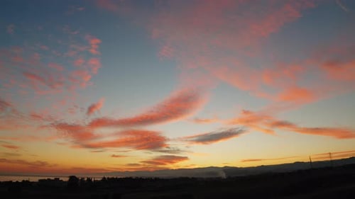 Sunset Sky Orange and Silhouette of Mountains