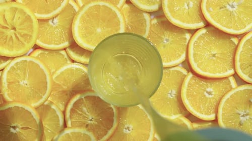 Refreshing Orange Juice Poured Into Glass