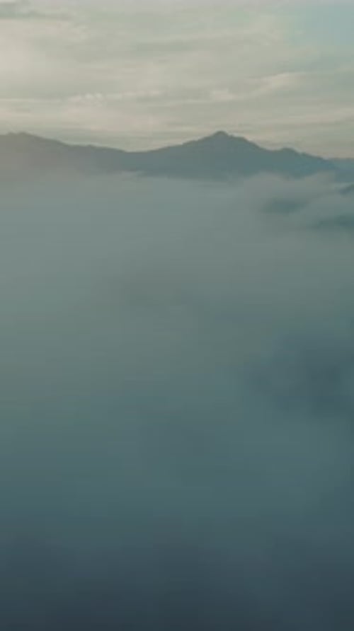 Aerial Footage of Mountains and Cloudscape in Vertical Orientation