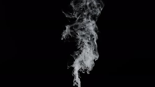 Wispy Smoke Rising on Black Background in Slow Motion