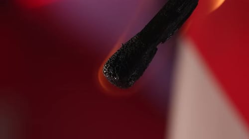 Burning Matchstick in Extreme Close-Up